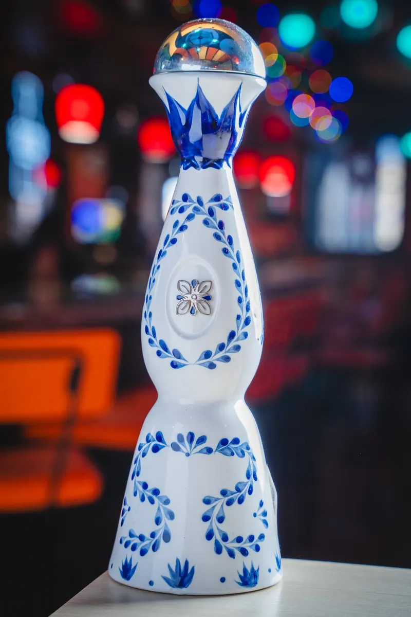 A Clase Azul tequila bottle on the bar