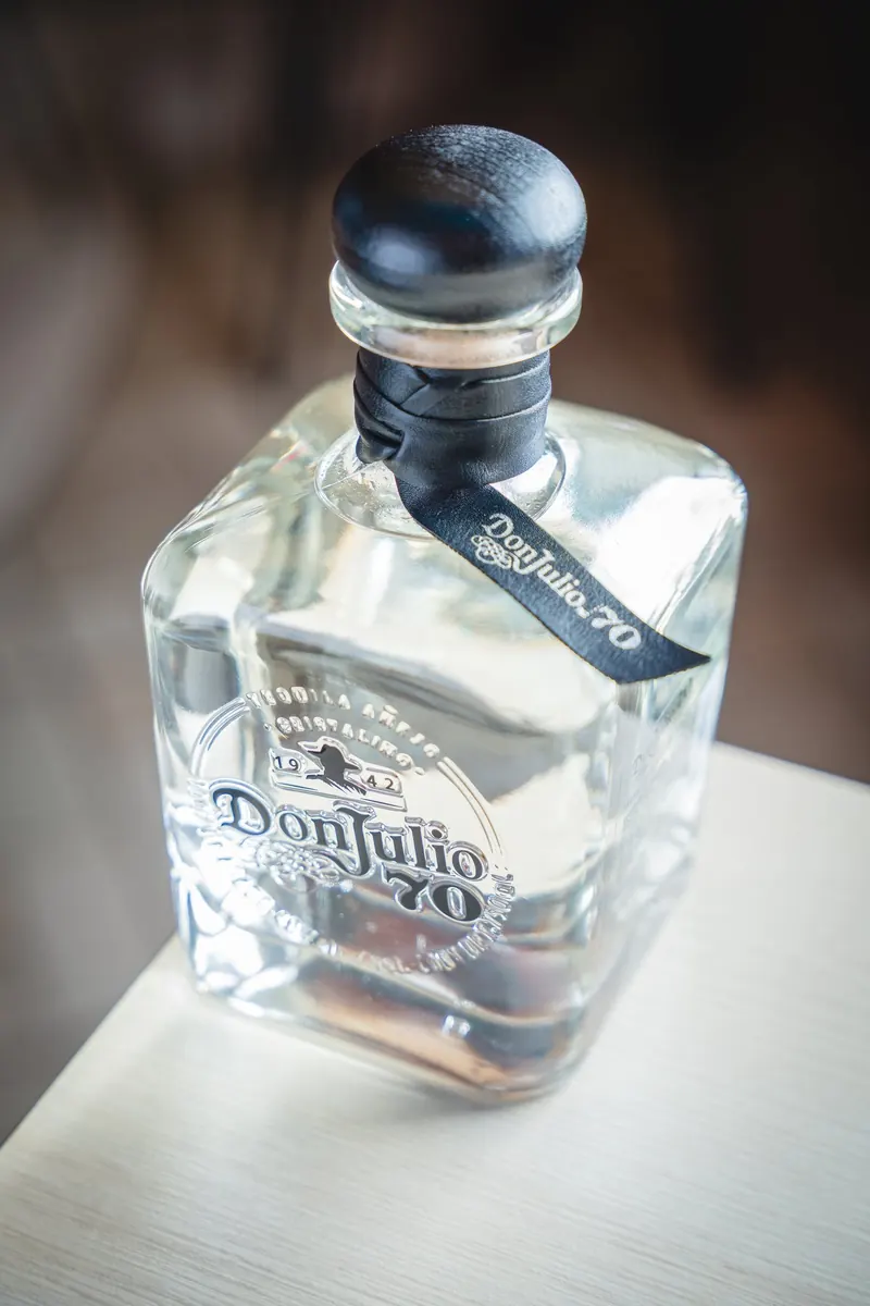 A Don Julio 70 tequila bottle