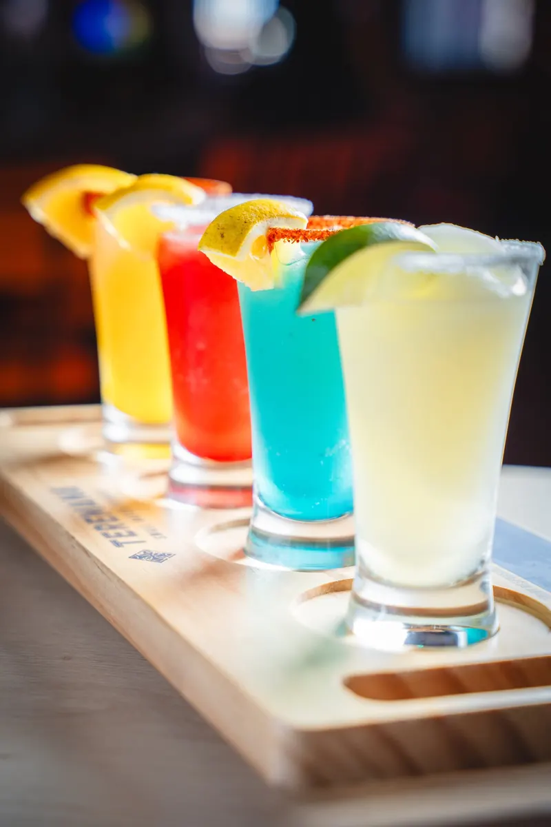 The Margarita Sampler, four flavors on a wood paddle