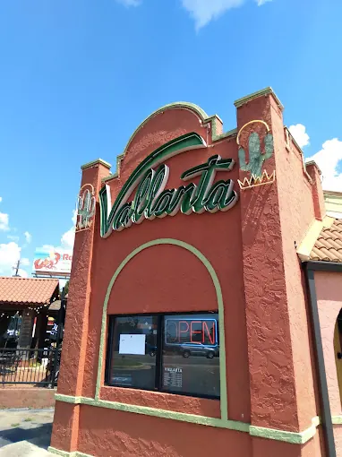 The Vallarta tower on Washington Rd with the green neon sign