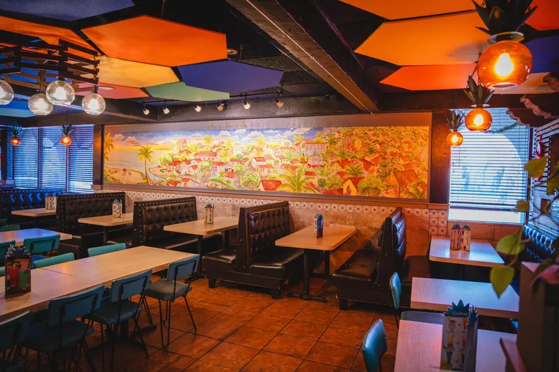 Booths along the mural wall