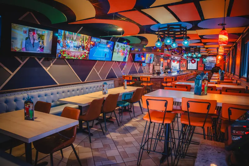 Tables and TVs in the dining room